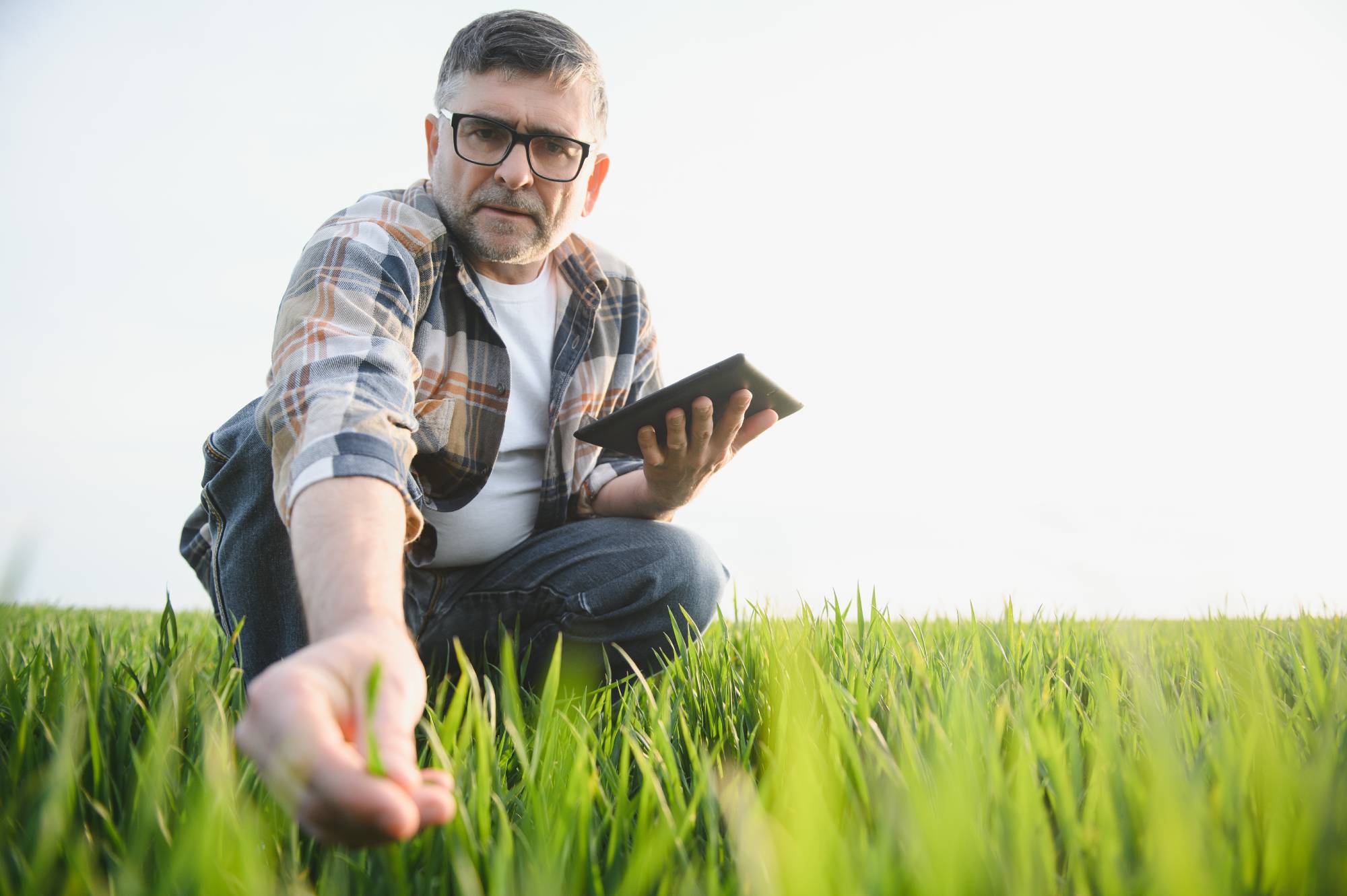 Farmer using mobile device